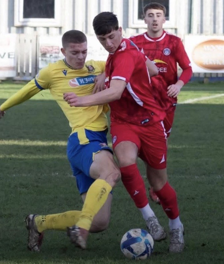 Joe Eason defending for Marske United